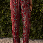 Close-up of fuchsia pink rayon straight pants with ikat print from the co-ord set, highlighting the relaxed fit and comfortable style